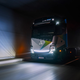 A photo of the front of the Mercedes-Benz eActros long haul electric truck as it drives through a tunnel.